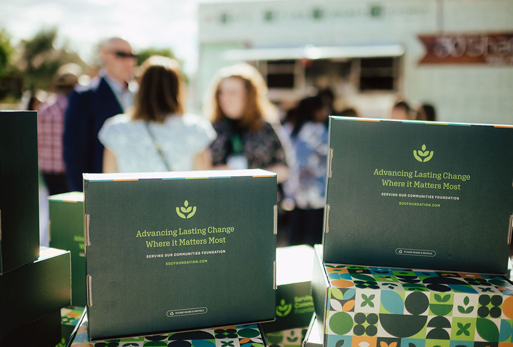 event gift boxes among a group of non-profit event attendees